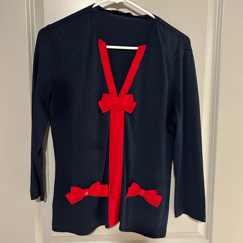 Carolina Herrera blue jersey top with red bow detail